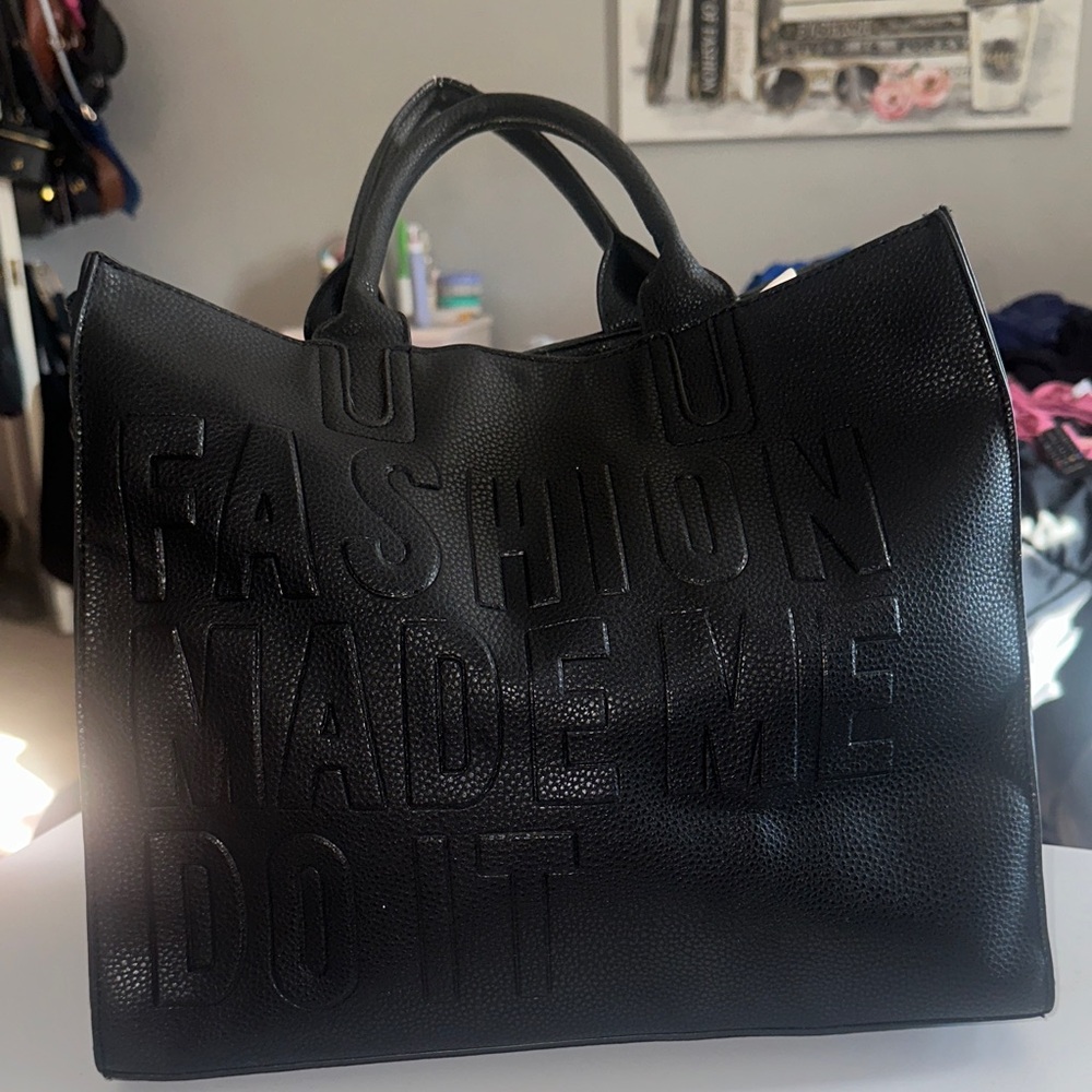 Chic Black Tote Bag with Embossed Design